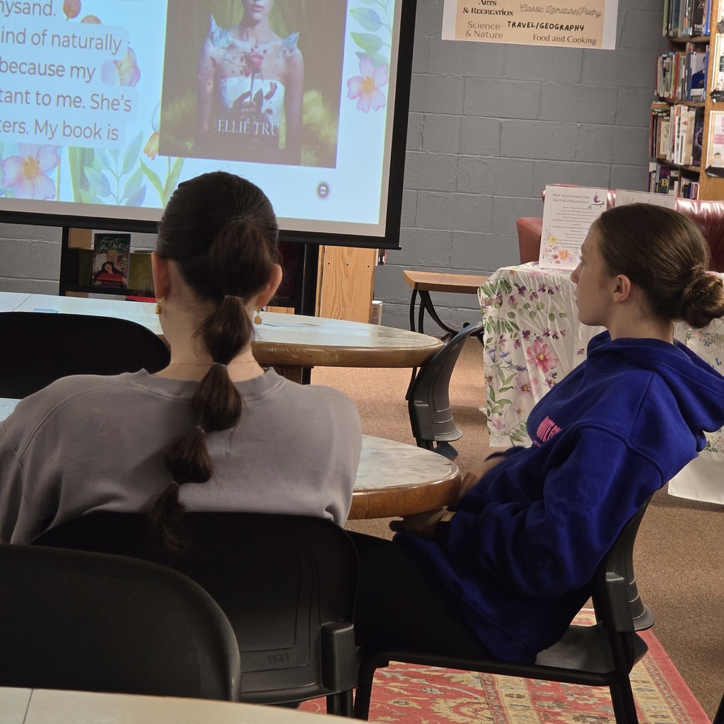 St. James teacher speaks to student about her published book!
