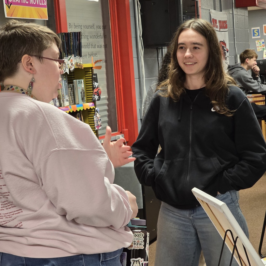 St. James teacher speaks to student about her published book!