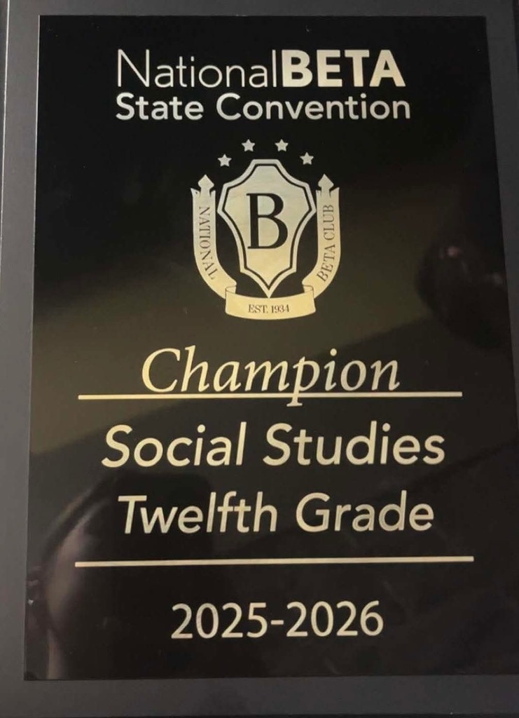 Black plaque with gold text reading "National BETA State Convention" and "Champion Social Studies Twelfth Grade 2025-2026".