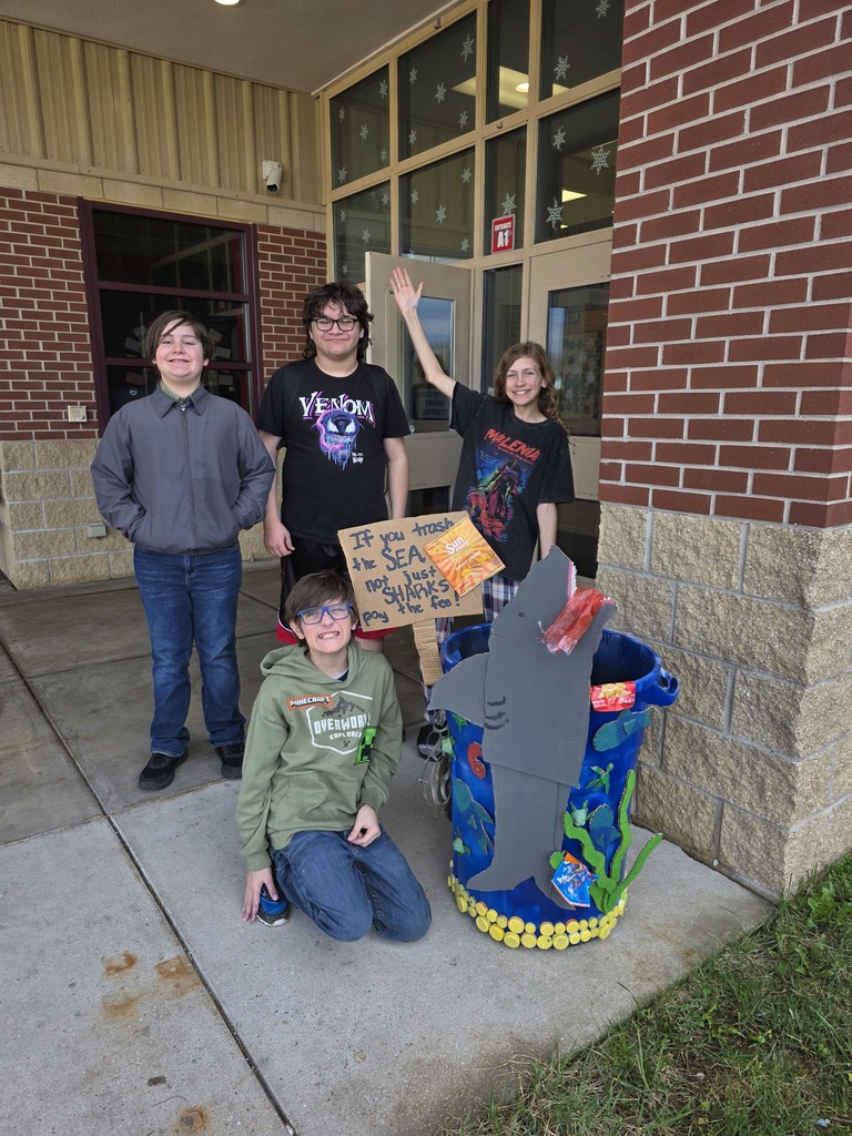 Students decorate trash can for MODOT competition. 