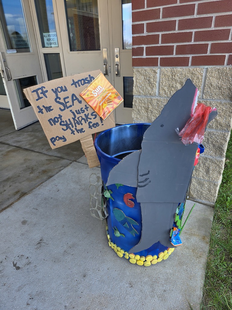 Students decorate trash can for MODOT competition. 