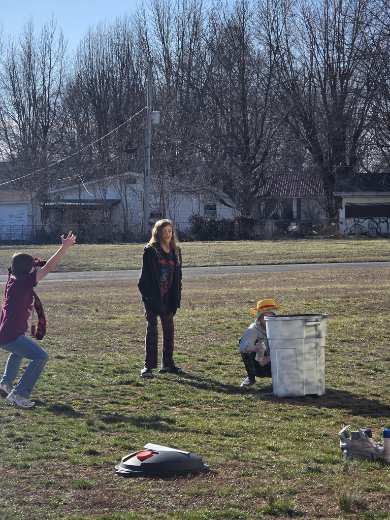 Students decorate trash can for MODOT competition. 