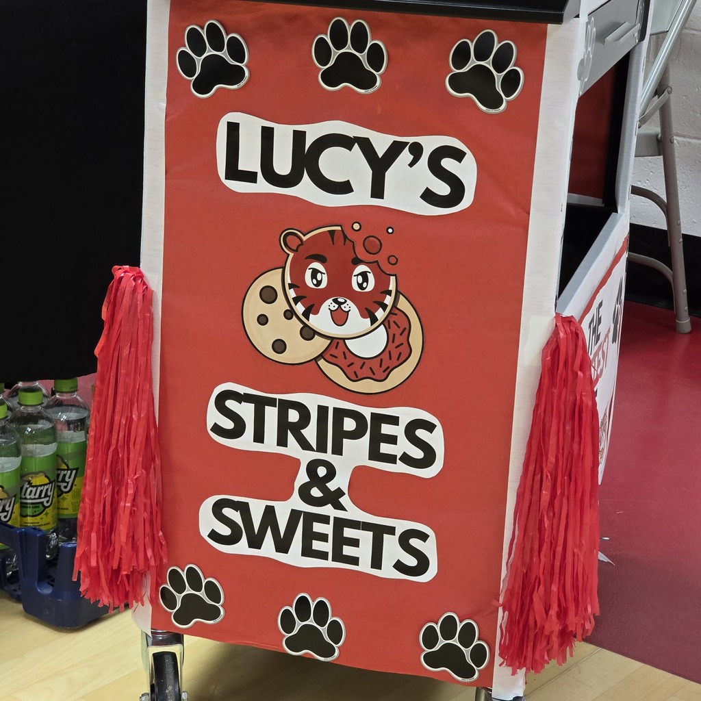 Red banner with paw prints, a tiger, and a cookie. Text reads "LUCY'S STRIPES & SWEETS". Red tassels hang on sides.