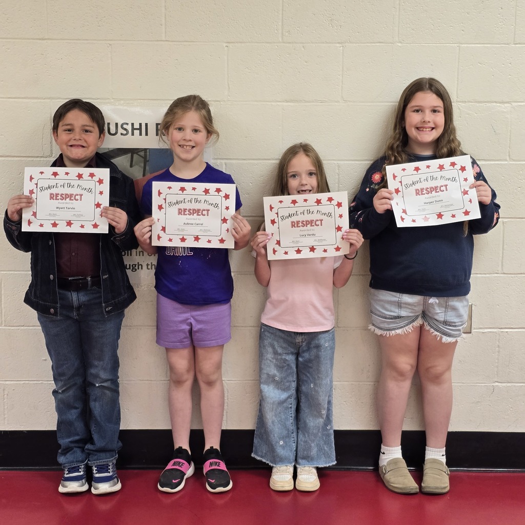 Five children stand in a line, each holding a certificate. Two of the children wear sneakers.