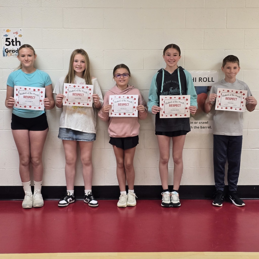 Five young people stand in a row, smiling. Each holds a certificate. A white wall behind them has two signs: "5th Grade" and "4 Roll".