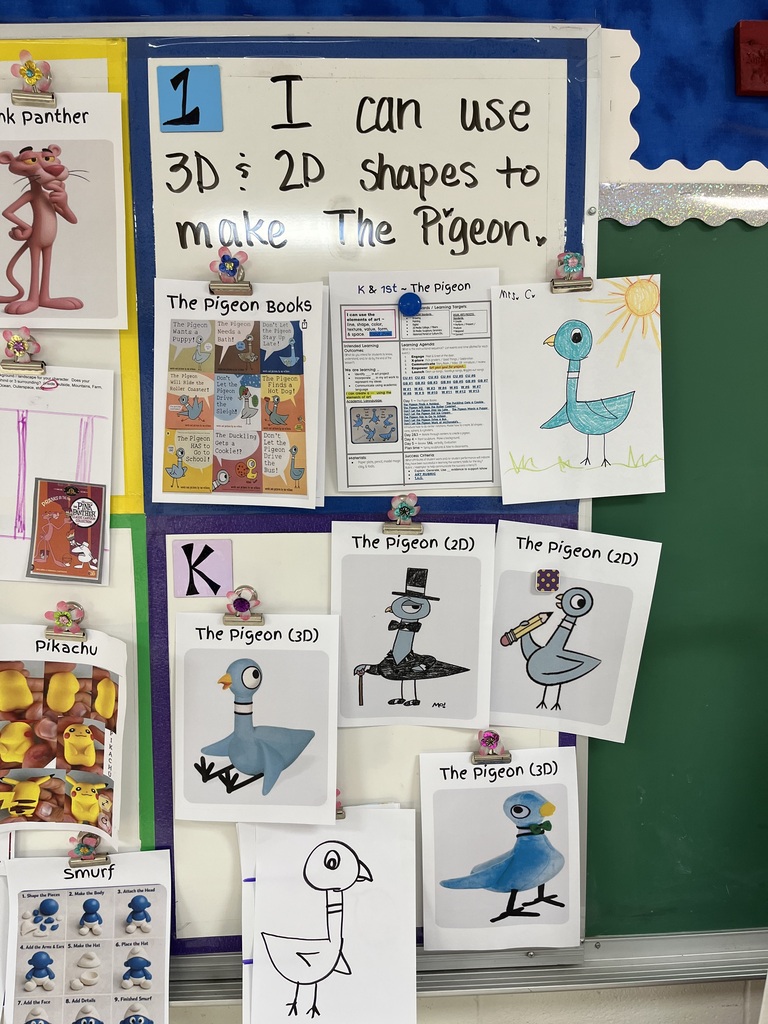 A classroom bulletin board displays student art and educational materials. Art includes drawings of birds. Text reads "I can use 3D: 2D shapes to make The Pigeon".