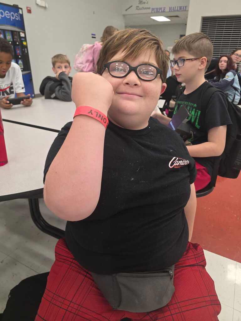 Students pose with their Grape and Fall Festival wristbands!