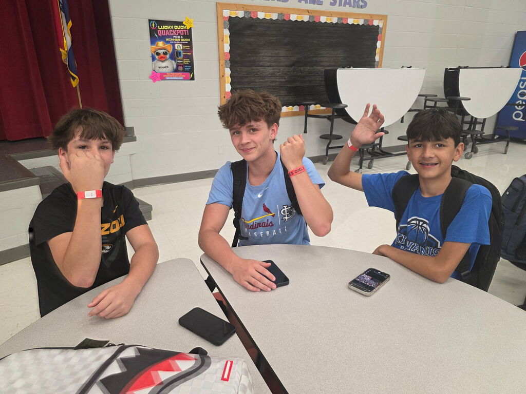 Students pose with their Grape and Fall Festival wristbands!