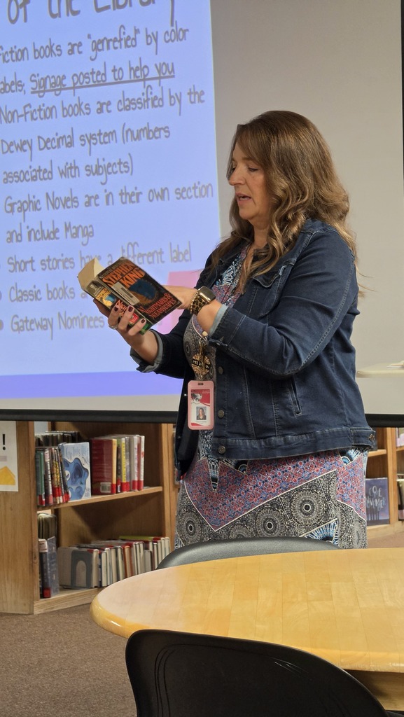 9th grade students visit the high school library.