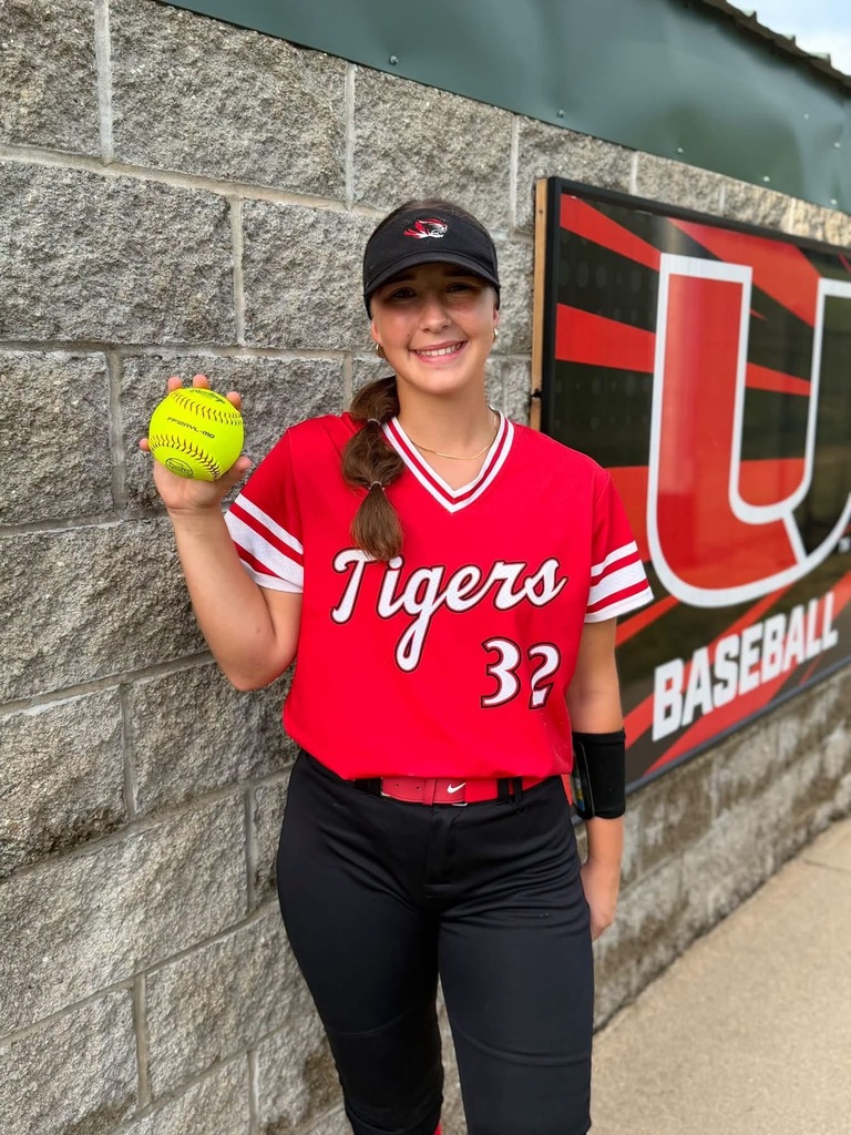 Raegan Witt holding home run ball