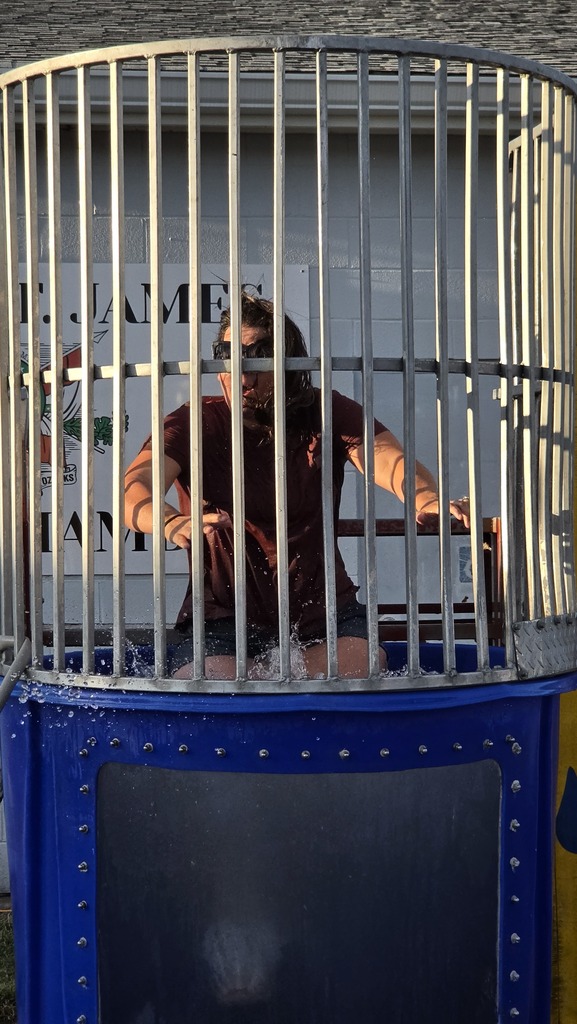 Teachers participate in the Dunk Tank for Project Graduation
