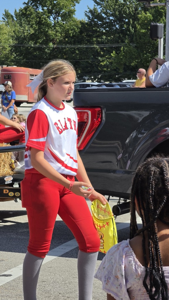 Student walking in the parade.