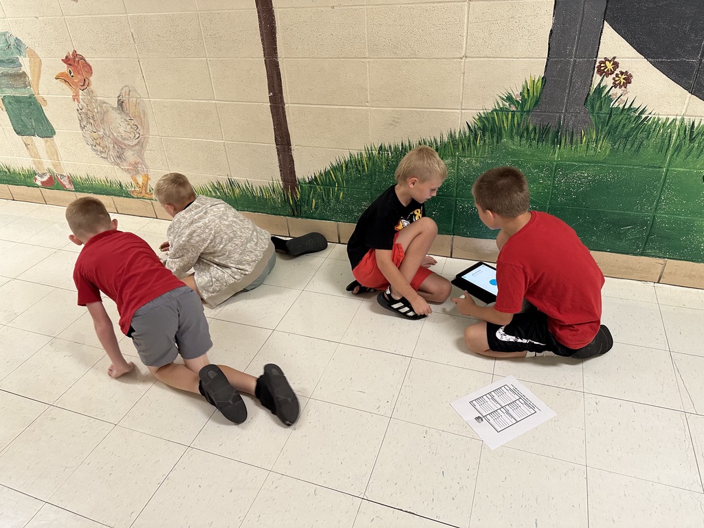 Robotics Club programs Spheros for a challenge.