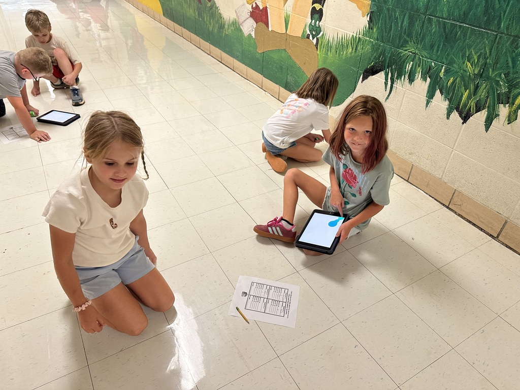 Robotics Club programs Spheros for a challenge.