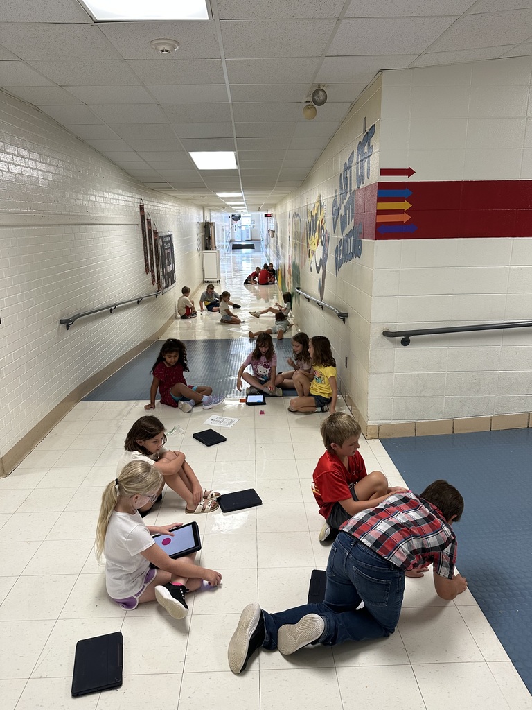 Robotics Club programs Spheros for a challenge.
