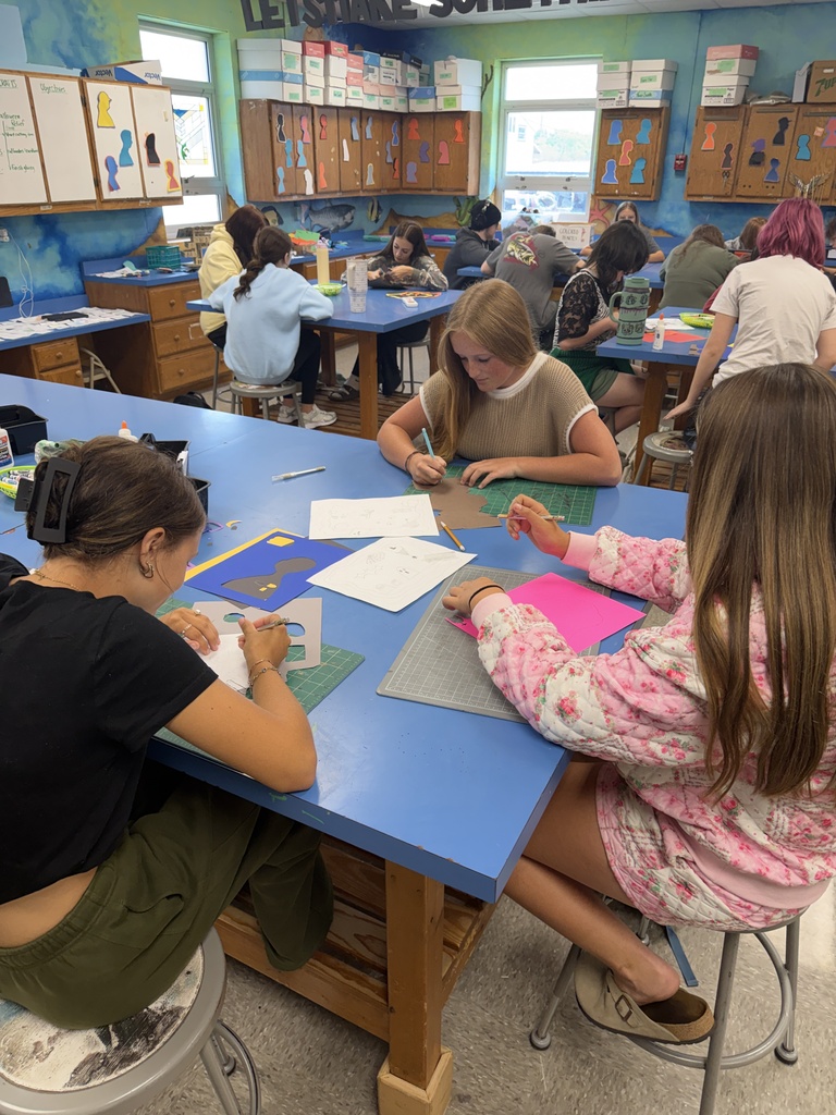 Students create three dimensional art at the high school. 