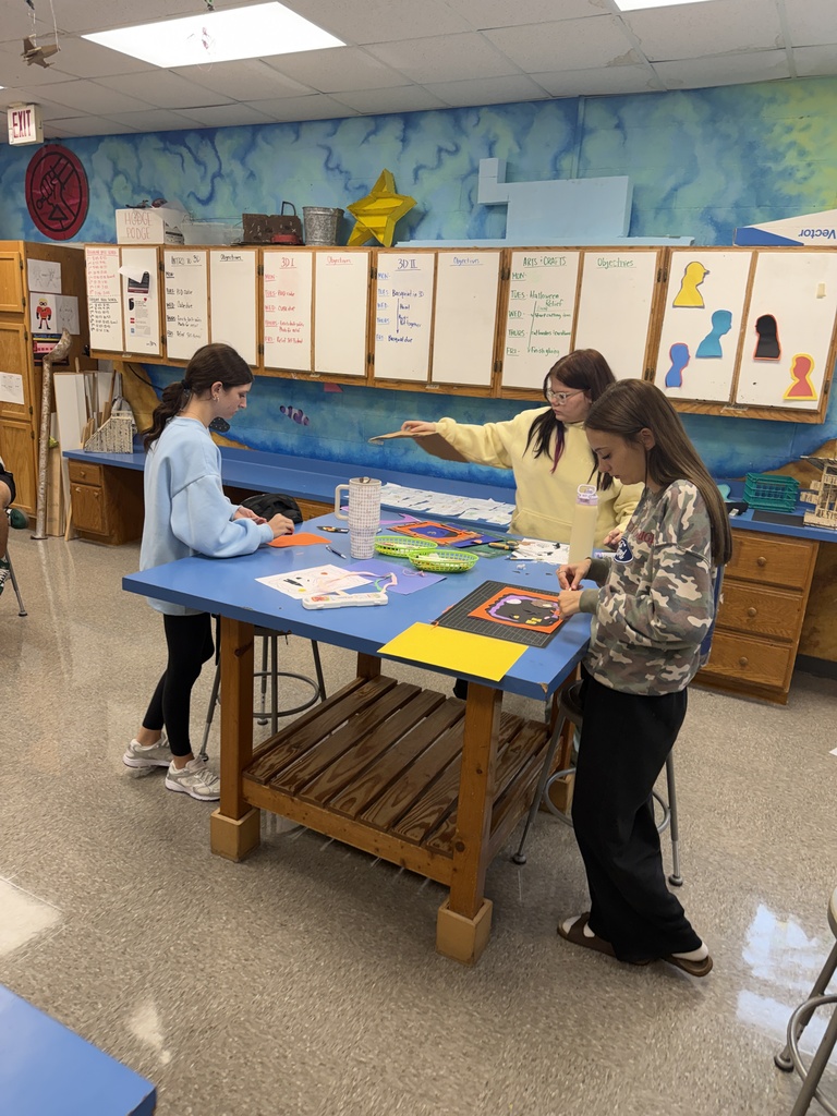Students create three dimensional art at the high school. 