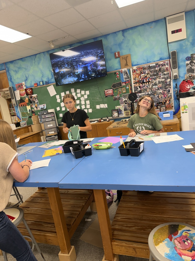 Students create three dimensional art at the high school. 