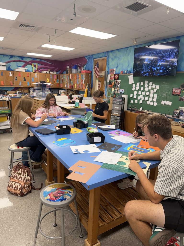 Students create three dimensional art at the high school. 