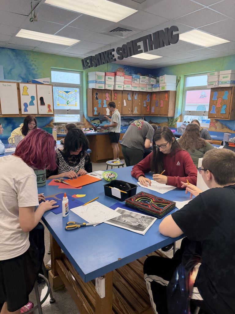 Students create three dimensional art at the high school. 