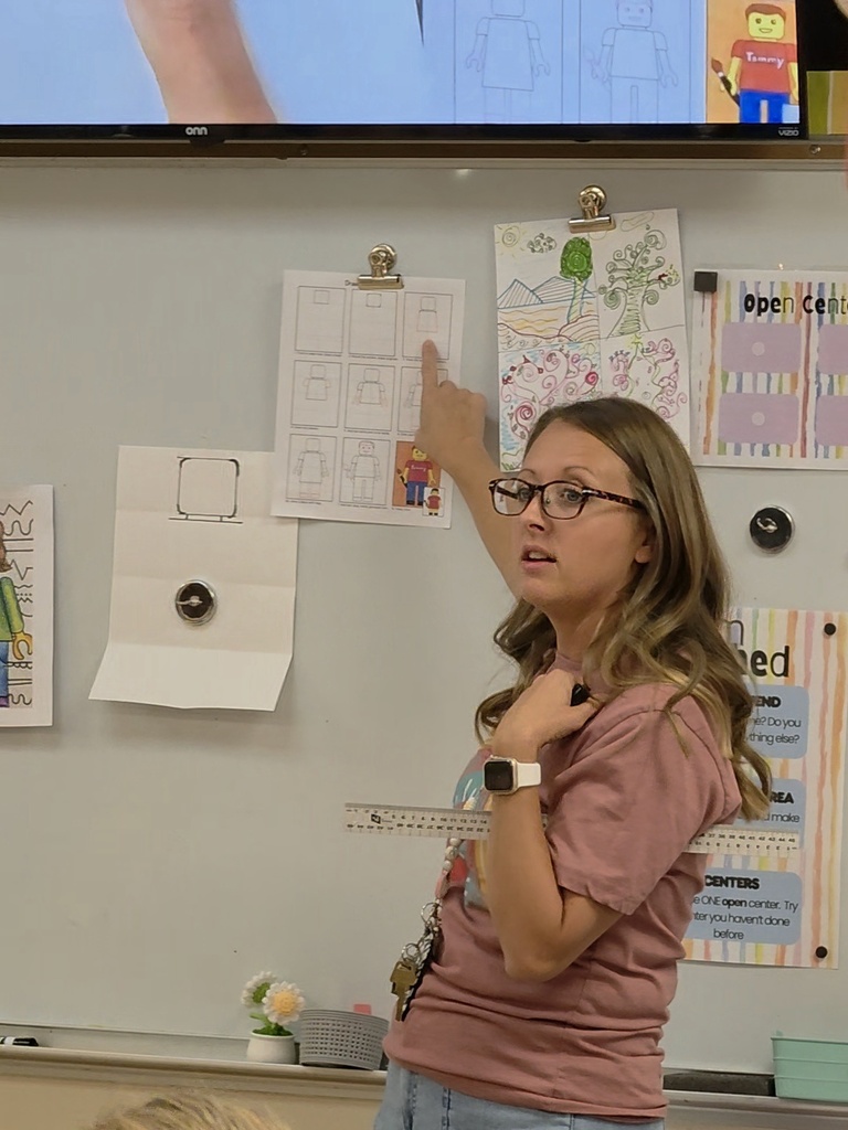 Fourth grade students create LEGO self-portraits.
