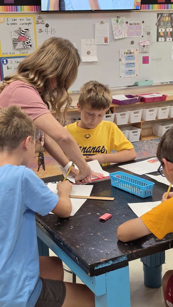 Fourth grade students create LEGO self-portraits.