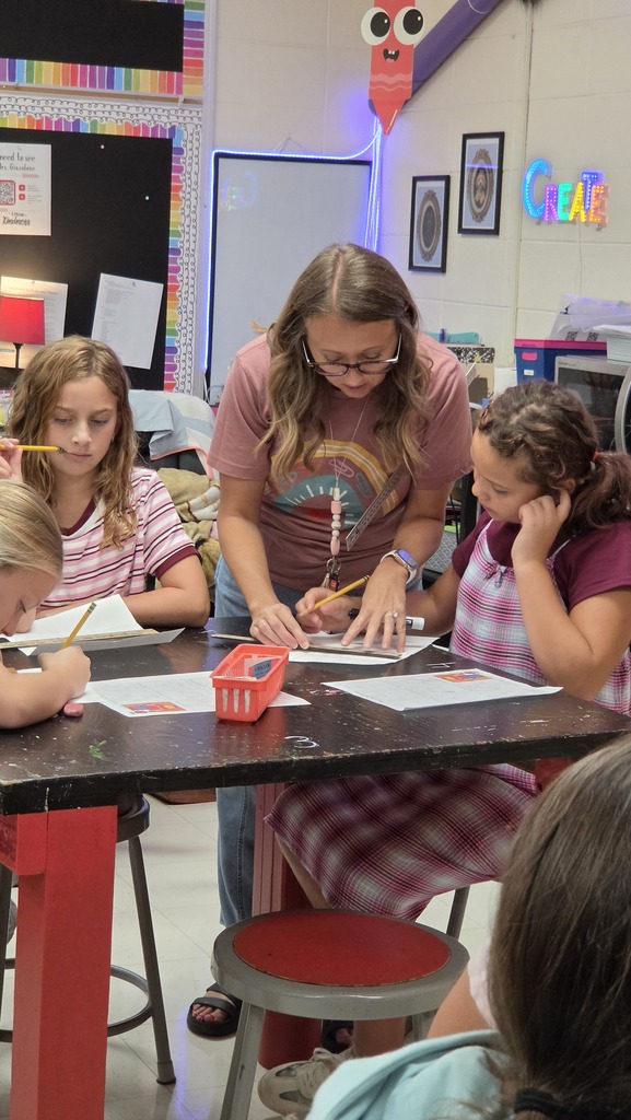 Fourth grade students create LEGO self-portraits.