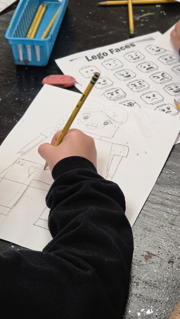 Fourth grade students create LEGO self-portraits.