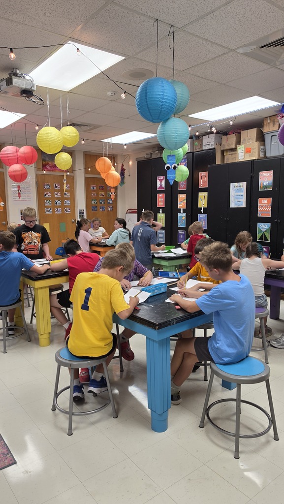 Fourth grade students create LEGO self-portraits.