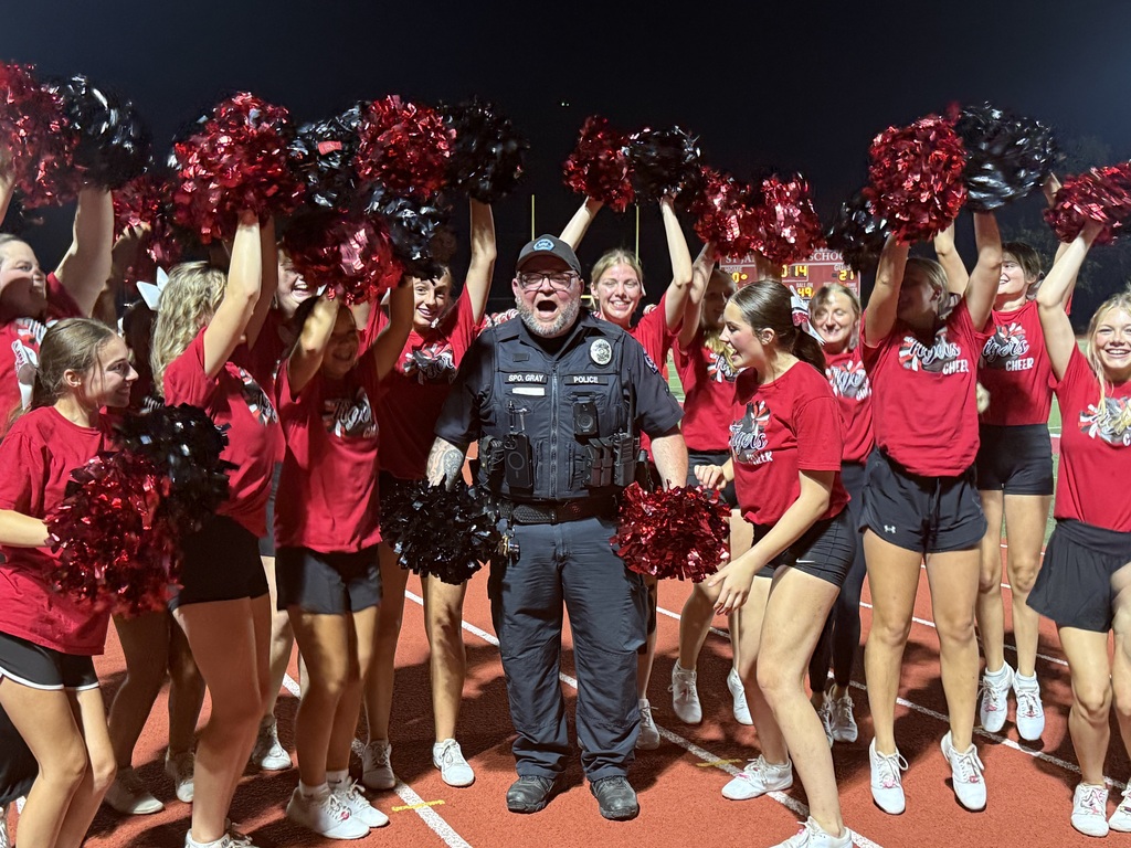 School SRO with cheerleaders
