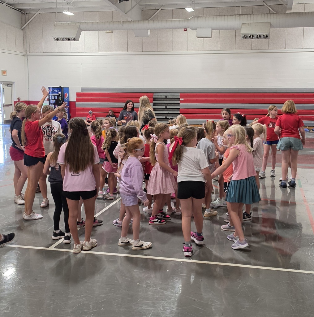 Cheer camp showcases Social Integrity through mentorship.