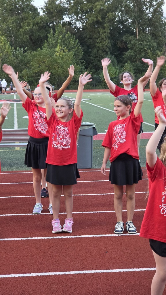 Cheer camp showcases Social Integrity through mentorship.