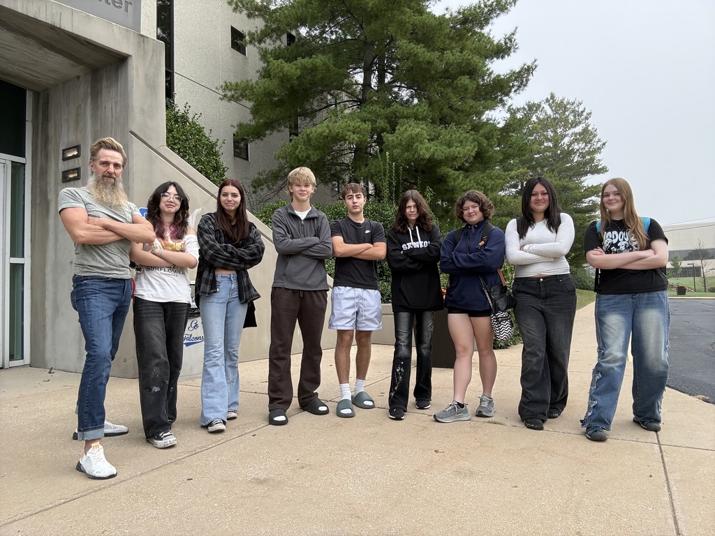 Tigers pose outside of ECC for Art Day.