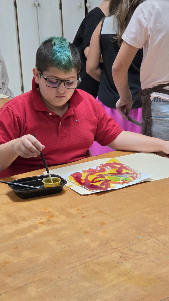 LWJE artists use "invisible" ink to create fall paintings.
