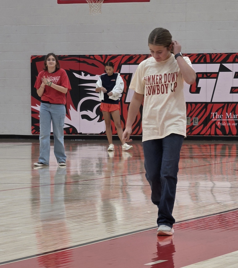 Middle school PE students participate in their kickball unit.