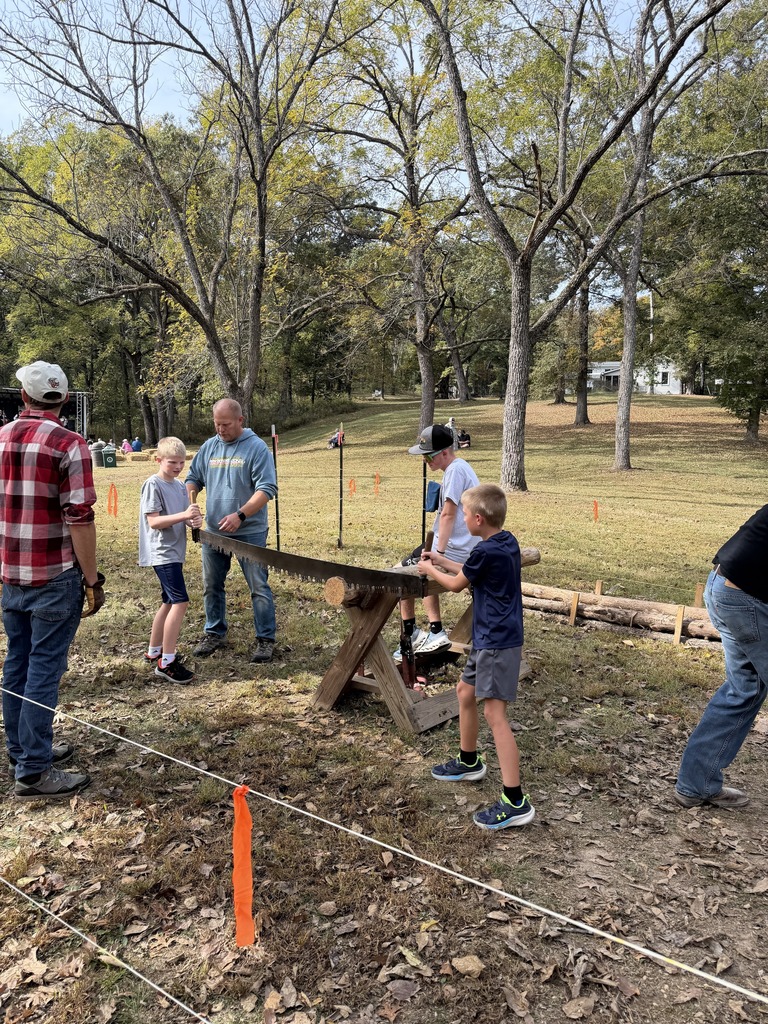 Cross Country student-athletes volunteer at Old Iron Works Day!