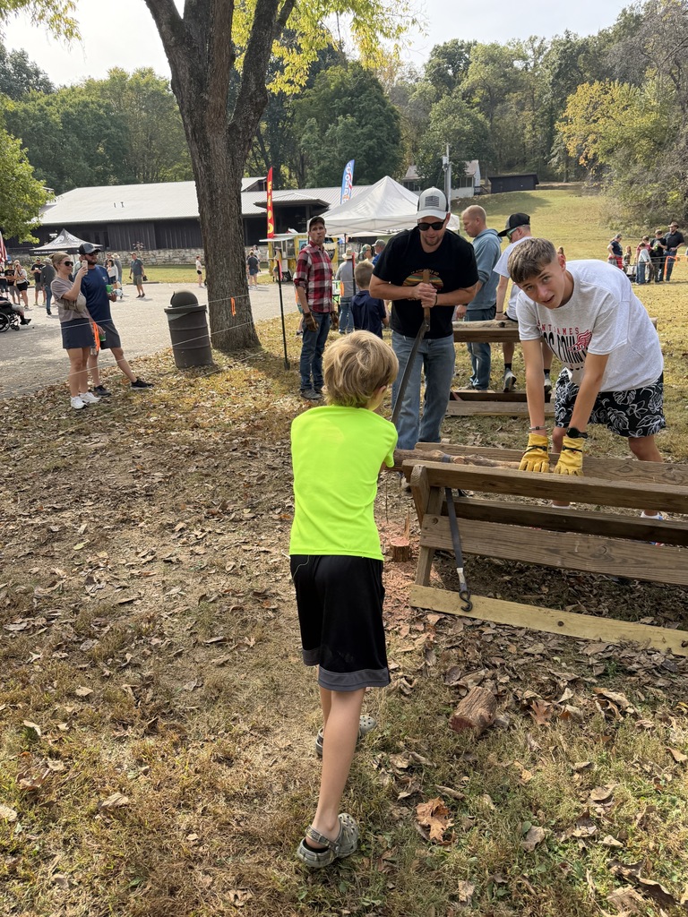 Cross Country student-athletes volunteer at Old Iron Works Day!