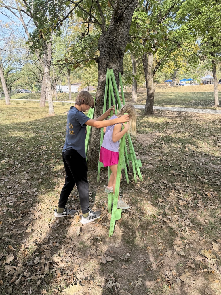 Cross Country student-athletes volunteer at Old Iron Works Day!