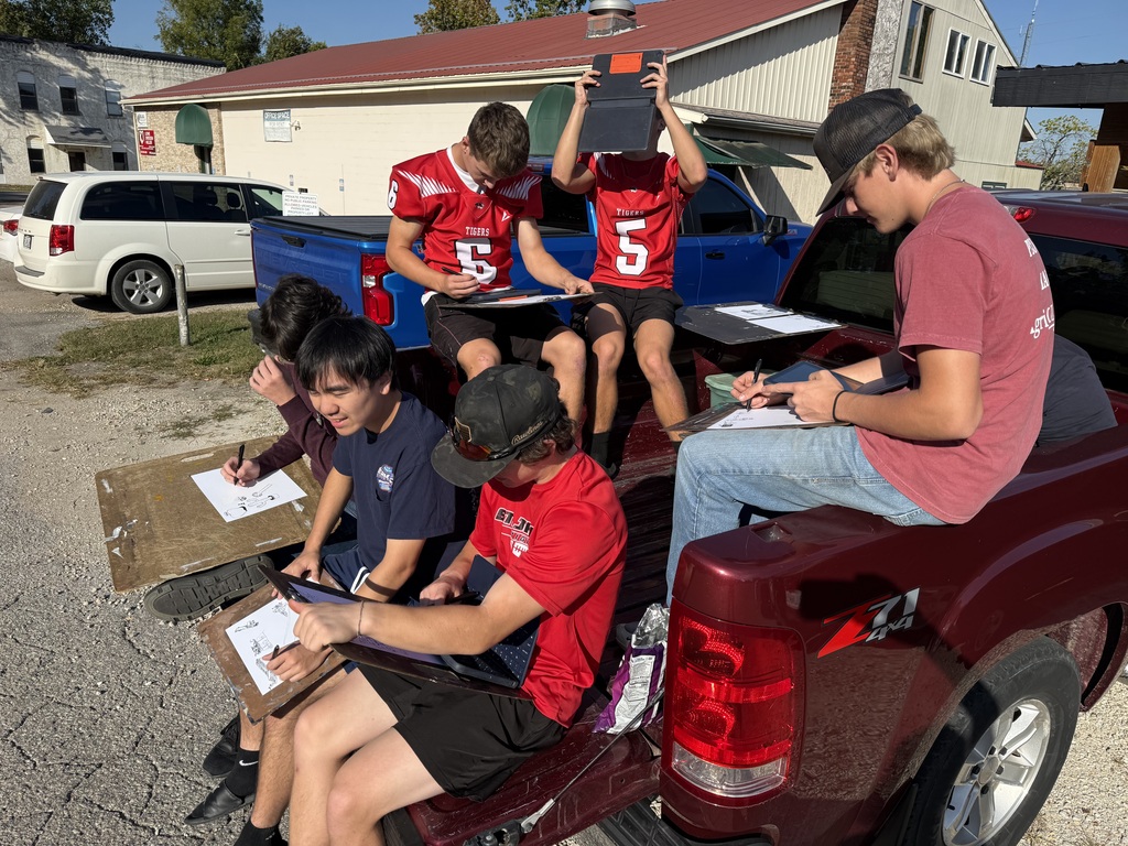 High school artists enjoy the Fall weather while sketching their design for Inktober.