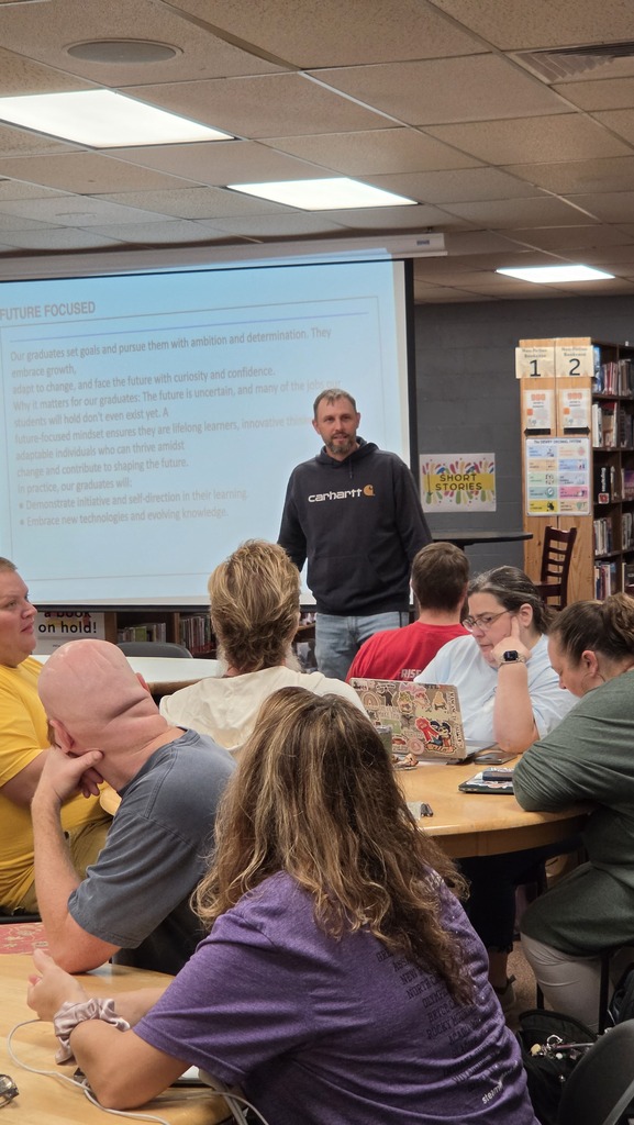 St. James teachers collaborate during professional development.