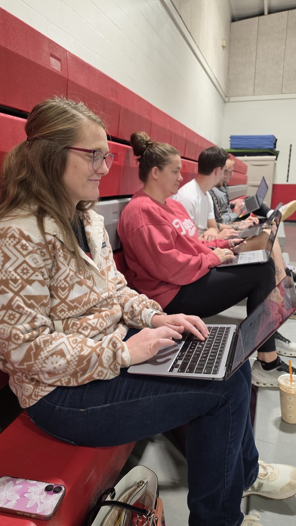 St. James teachers collaborate during professional development.