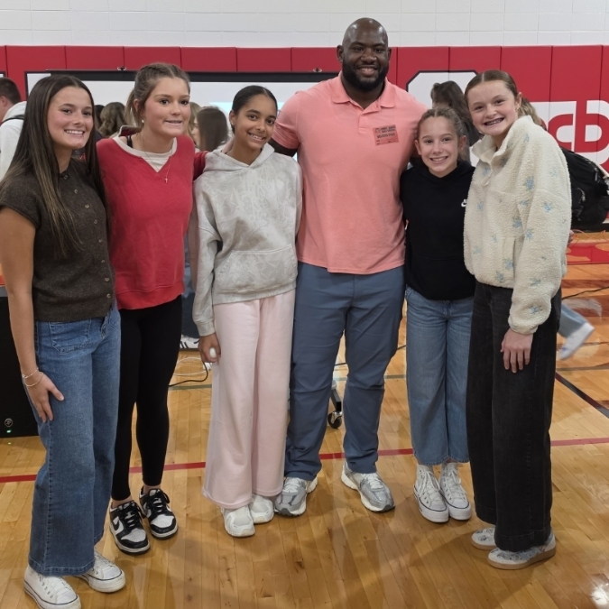 KD Hill shares message of resilience to St. James students.