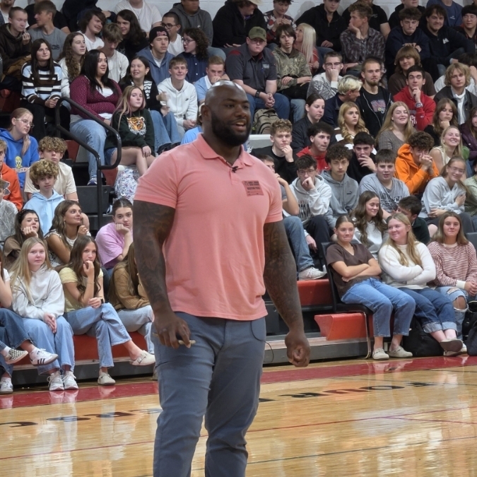 KD Hill shares message of resilience to St. James students.