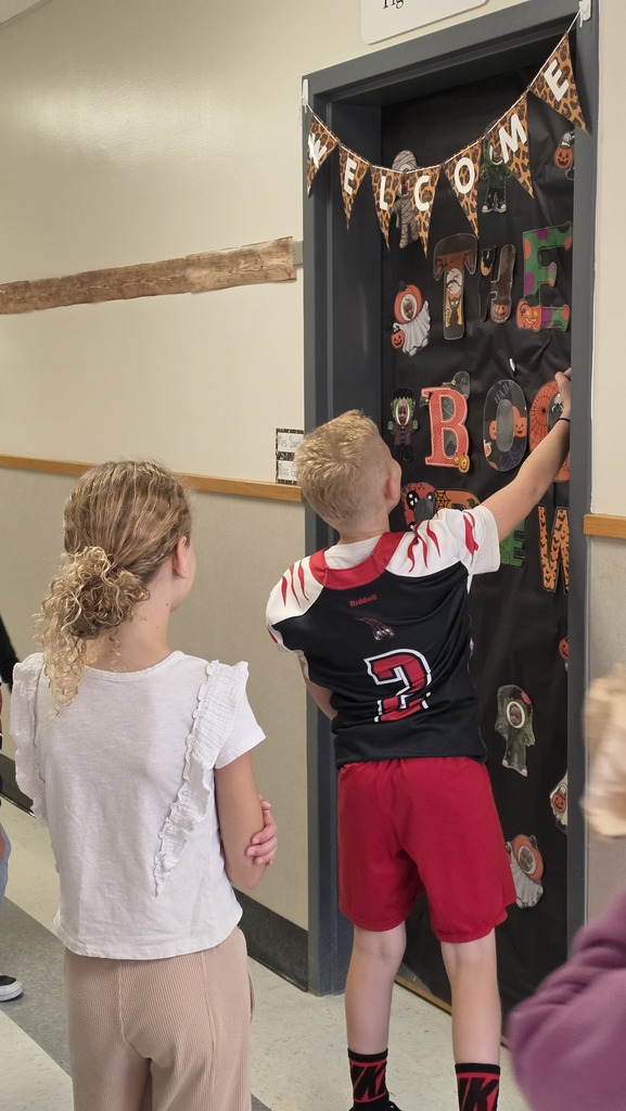 LWJE Student Council members judge Halloween doors!