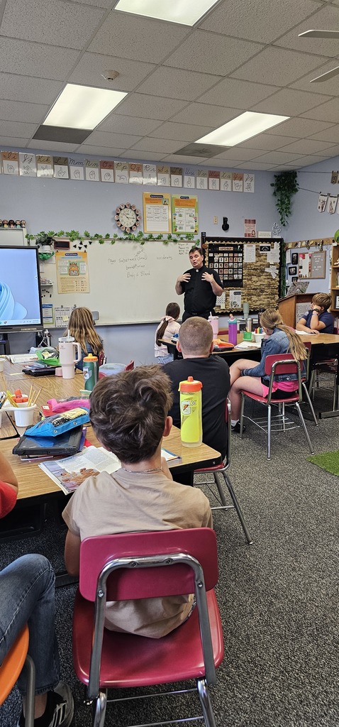 St. Joseph Community School - Impromptu eucharist lesson with Father