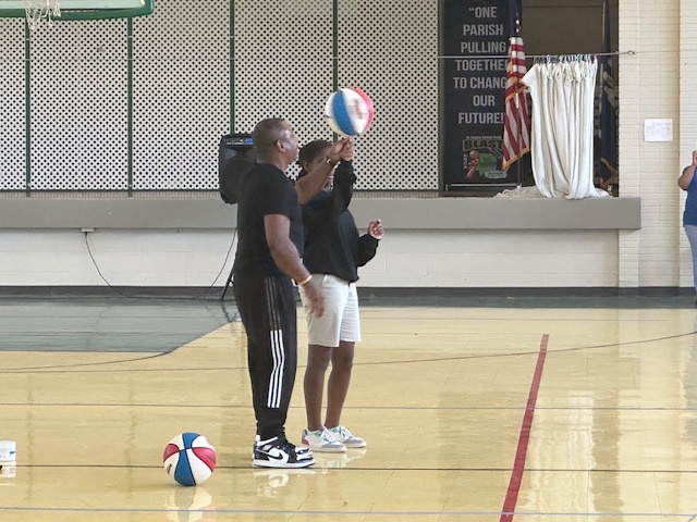 Buffy "Mr. Magic" Coleman and Plaisance Middle students