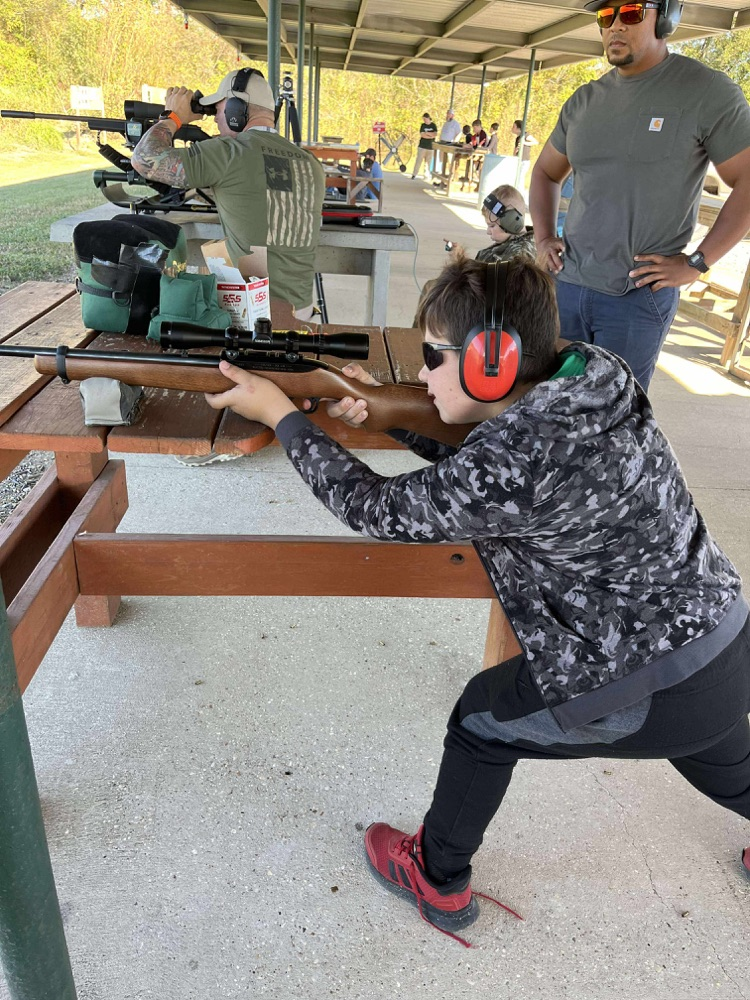 4H members, Blaise B., Tate Y., and Randi K. attended shooting sports practice. Members practiced rifle, shotgun, and archery sports. By: Reporter, Randi K.