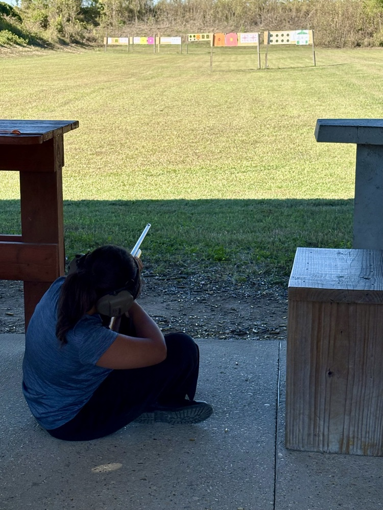 4H members, Blaise B., Tate Y., and Randi K. attended shooting sports practice. Members practiced rifle, shotgun, and archery sports. By: Reporter, Randi K.