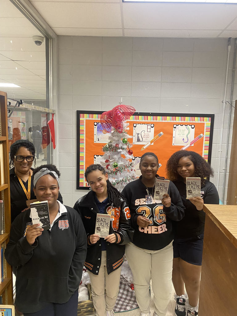Mrs. Guillory, OHS Librarian pictured with OHS Book Club participants