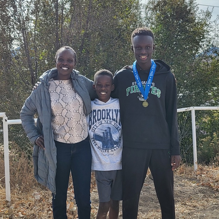 Mrs. Kiptui, Emmanuel, and Ethan 